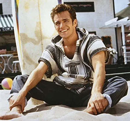 Luke Perry as Dylan McKay wearing a Baja Hoodie